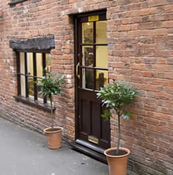 Photograph of the Outside of the Hair Salon at Backstage Hair Cutters